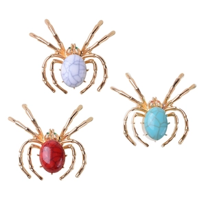 Set of three vintage spider brooches in gold finish with turquoise and red stones