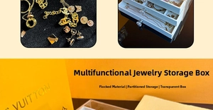 Close-up of three-layer acrylic jewelry box with velvet drawers for rings and earrings