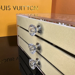 Three-layer acrylic jewelry box with velvet lining and clear crystal drawer handles