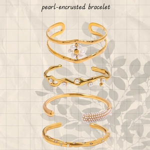 Golden stainless steel pearl bracelets in four artistic designs on a textured background