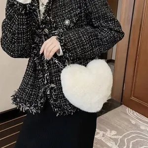 White heart-shaped faux rabbit fur crossbody bag with silver chain strap for women