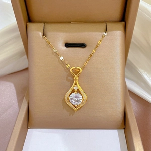 Gold plated water drop necklace with sparkling zircon pendant on champagne satin