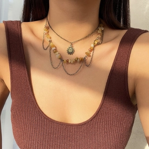 Bohemian multi-layer necklace with bronze sun pendant and natural yellow stone beads