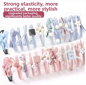 High elasticity hair tie set with ribbons, pearls, and floral charms in pastel colors