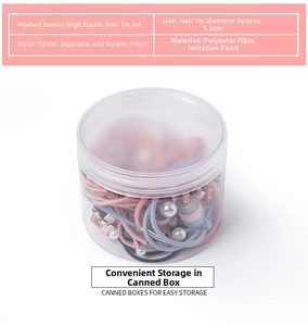 Detail view of high elastic hair ties with faux pearls and 5.5cm diameter measurement