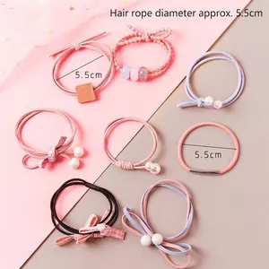 8-piece set of elastic hair ties with pearls and bows in pink and blue, 5.5cm diameter