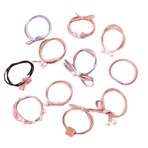 Pink high-elastic hair tie set featuring pearls and floral charms on a white background