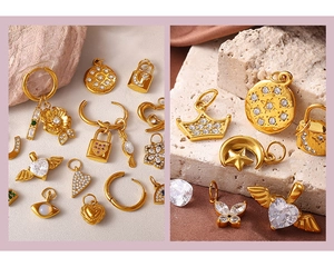 Detail of assorted gold heart and star pendants with inlaid cubic zirconia and crystals