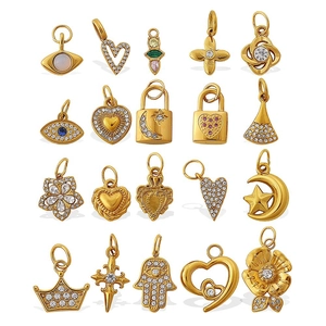 Collection of 20 gold plated brass charms with hearts, stars, and micro-inlaid zircons