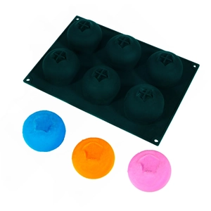 Detail of 6-cavity silicone mold with blueberry-shaped resin and candle crafts
