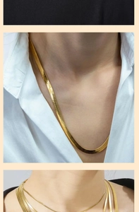 Detail of gold herringbone snake chains in various widths shown on clothing models