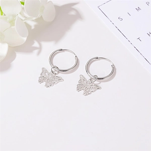 Minimalist silver butterfly hoop earrings with hollow wing design for women