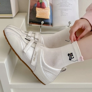 Silver metallic velcro sneakers with Chio 2nd logo paired with white embroidered crew socks