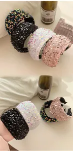 Detail of four-color sequin headbands showing shimmering texture and non-slip inner lining
