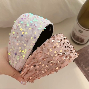Wide sequin headbands in iridescent white and rose gold with non-slip black lining