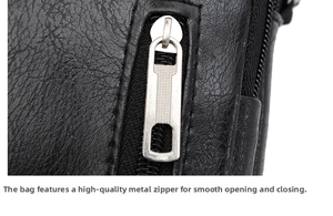 Détail macro d'une fermeture éclair argentée sur un sac en cuir noir à grain fin