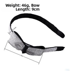 Dettaglio del cerchietto con fiocco di strass neri lucidi con fiocco lungo 9 cm