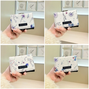 Detailed views of a mini floral tri-fold wallet with a metal clasp and vintage print