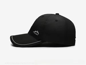 Detail of lightweight quick-dry sport cap featuring embroidered mountain peak and reflective edge