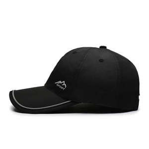 Detail view of sport cap with reflective brim edge and side sport icon branding