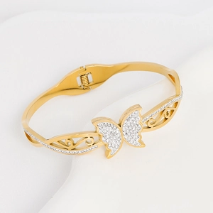 Gold titanium steel butterfly bangle with full diamond pavé accents and open design