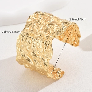 Detail view of the wide hammered metal cuff bracelet showing exact size measurements