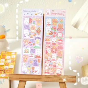 Detailed view of cute laser DIY stickers with rabbit and bear patterns for journaling