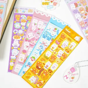 Detail of colorful laser aesthetic stickers featuring cute bears and rabbit designs