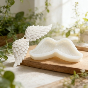 Silicone angel wings mold for DIY resin casting with intricate feather texture detail