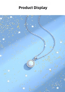 Detail of S925 sterling silver necklace with blue opal pendant and star background
