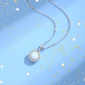 S925 sterling silver round blue opal necklace with diamond halo on starry background