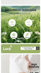 Detail showing high-stretch elastic cuff of white cotton socks with eco-friendly fibers
