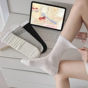 Ballet style ruffled cotton socks with vertical ribs in white, grey and black colors