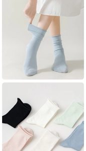 Elastic ribbed cotton socks in various colors showing stretch fit and soft knit texture