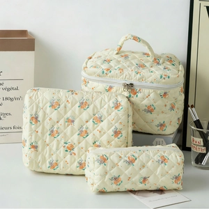 Quilted floral cotton cosmetic bag set with three sizes and portable top handle