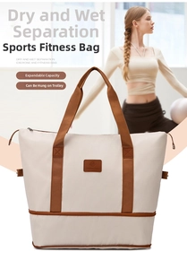 Detail view of the dry-wet separation pocket and expandable bottom on the cream gym bag