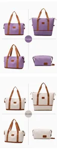 Detail view of large capacity travel bags in purple and cream white with reinforced straps