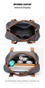 Detail of travel bag interior with zipper pockets showing large capacity storage