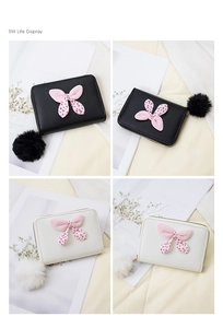 Short zipper wallets with bow tie and fluffy pom pom keychain in black and cream