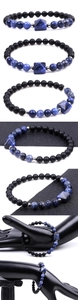 Dettaglio del bracciale occhio di tigre 6mm con perla a piramide e distanziali