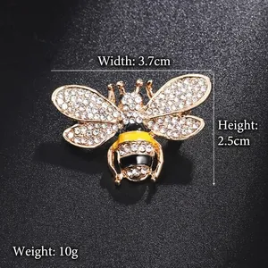 Detail view of crystal bee brooch with 3.7cm x 2.5cm dimensions and 10g weight details