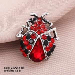 Detail view of ladybug brooch with red rhinestones, size 2.6x2.2cm, weight 7.3g