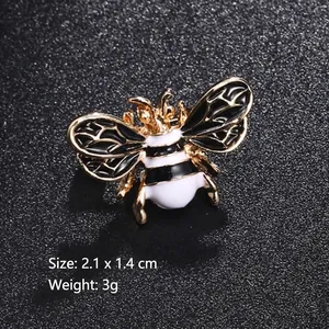 Golden honey bee enamel brooch pin with black and white wings, size 2.1 by 1.4 cm