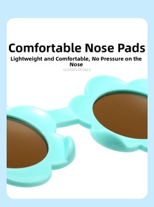 Détail des plaquettes de nez confortables en plastique sur lunettes de soleil enfant