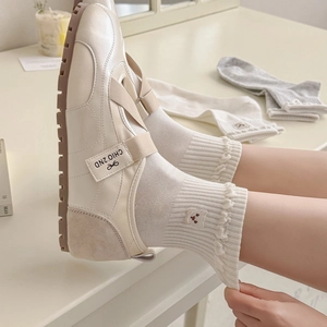 Cute Korean style socks with brown bear embroidery and wavy edges in cream white