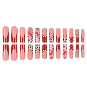 Red French coffin press-on nails with leopard print, cherry charms, and 3D textures