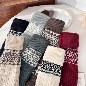 Vintage Fair Isle knit leg warmers in various colors for winter warmth and cozy styling