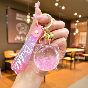 Portachiavi gatto rosa con sabbie mobili, perle galleggianti e ciondolo a stella