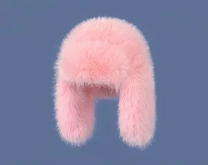Detail view of pink fluffy faux fur winter hat with earflaps on a blue background