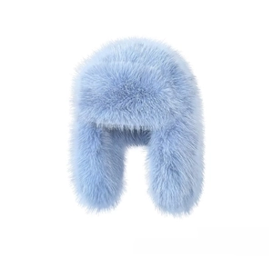 Detailed view of light blue faux fur trapper hat with thick plush insulation for winter